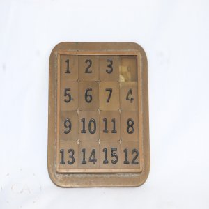 LOT 226 - Vintage Number Slide Puzzle Brass