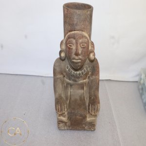 LOT 174 - Seated figure effigy vessel