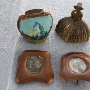 Mixed lot – painted souvenir bell, lady-in-crinoline bell and two copper miniature photo frames with old photos (Lot 219)