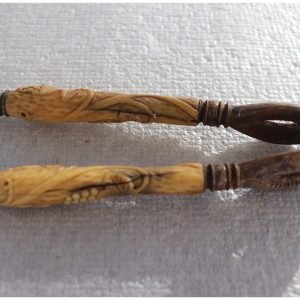 Antique nutcracker with carved grapevine handles