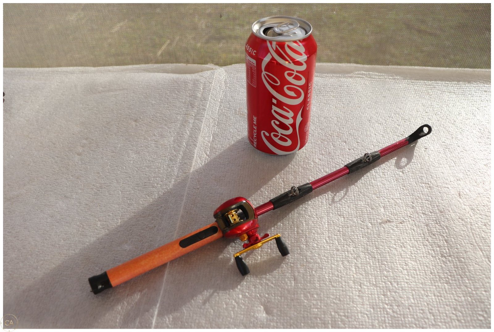 Lot 0270 - Novelty Fishing Rod Lighter with Reel (image 2)