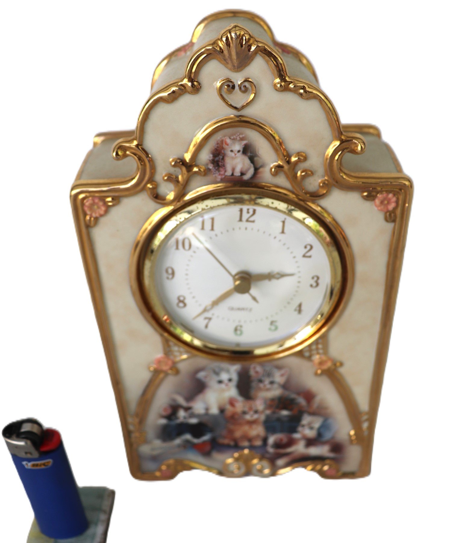 LOT 266 - Porcelain mantel clock – “Purr-fect Moments” cats, gilt trim