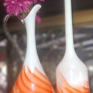 LOT 276 - Pair of white & orange employ glass vases