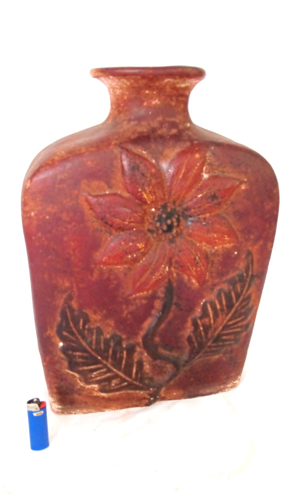 LOT 167 - Embossed Red Ceramic Vase with Flower Design