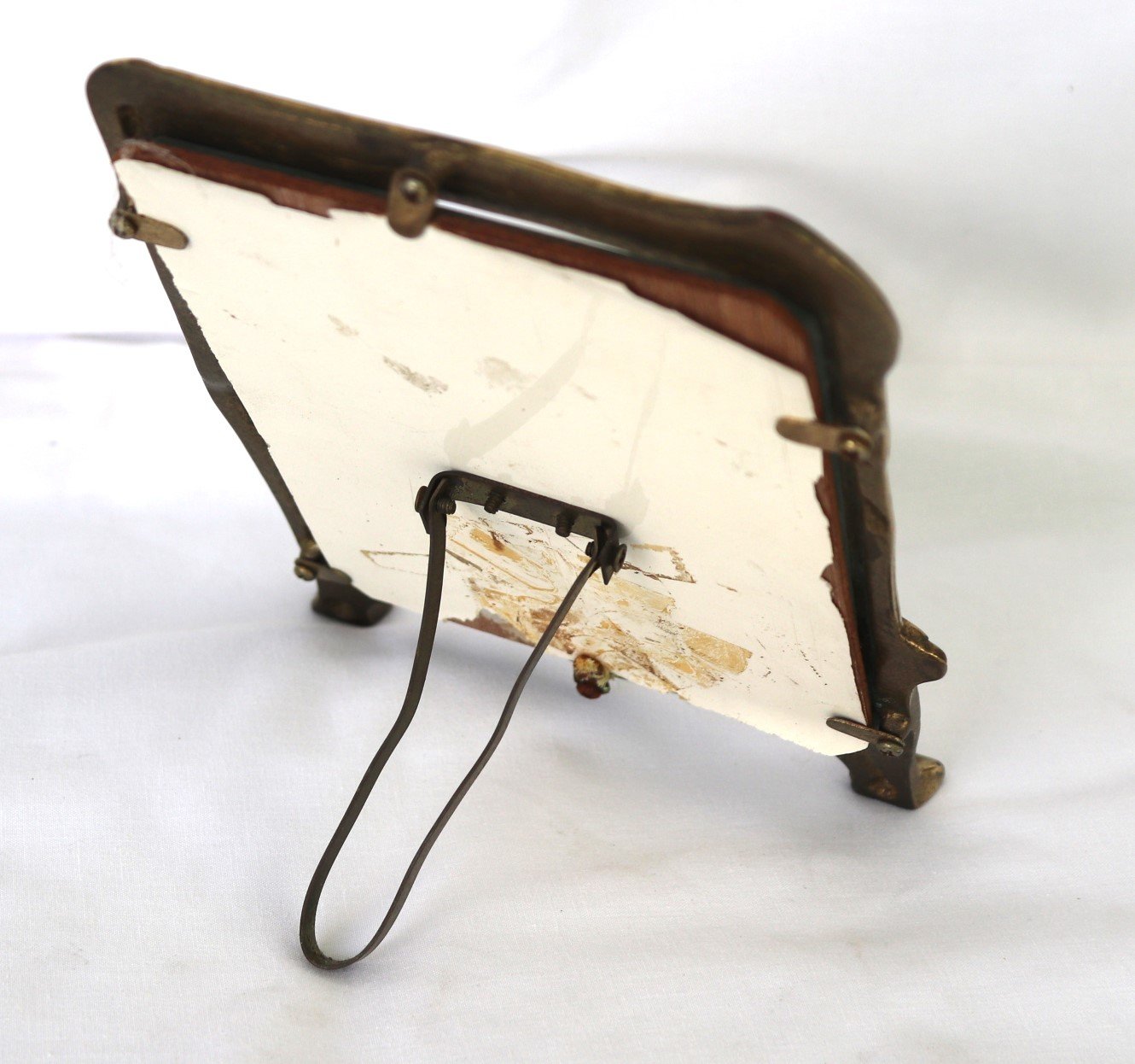 Rear view showing easel-back stand and backing board