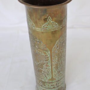 Tall engraved trench art brass shell casing vase with floral and animal motifs
