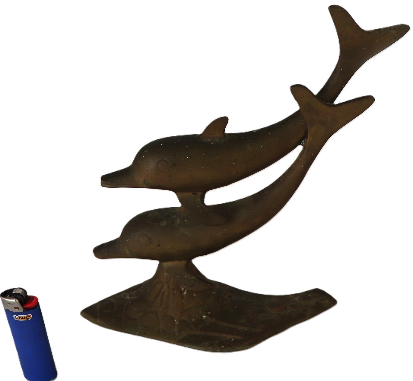Brass double dolphin figurine with lighter for scale