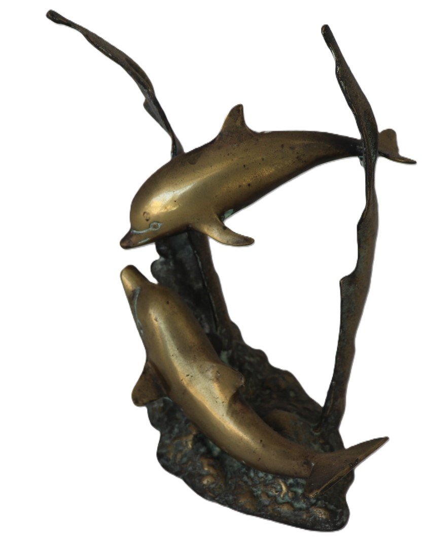 Brass dolphin pair sculpture with lighter for scale