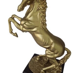 gold rearing horse sculpture on wooden plinth