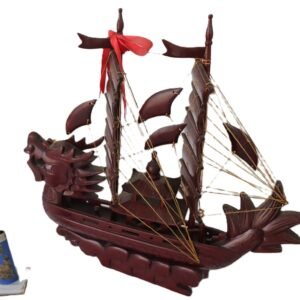 hand-carved wooden dragon ship model with sails and rigging