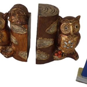 Pair of decorative owl bookends with golden finish and carved detailing