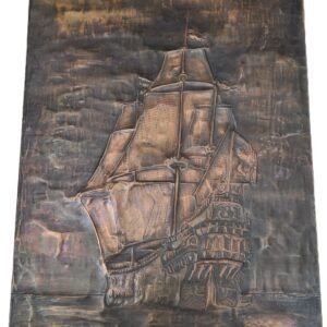 Hammered copper wall art of a galleon ship
