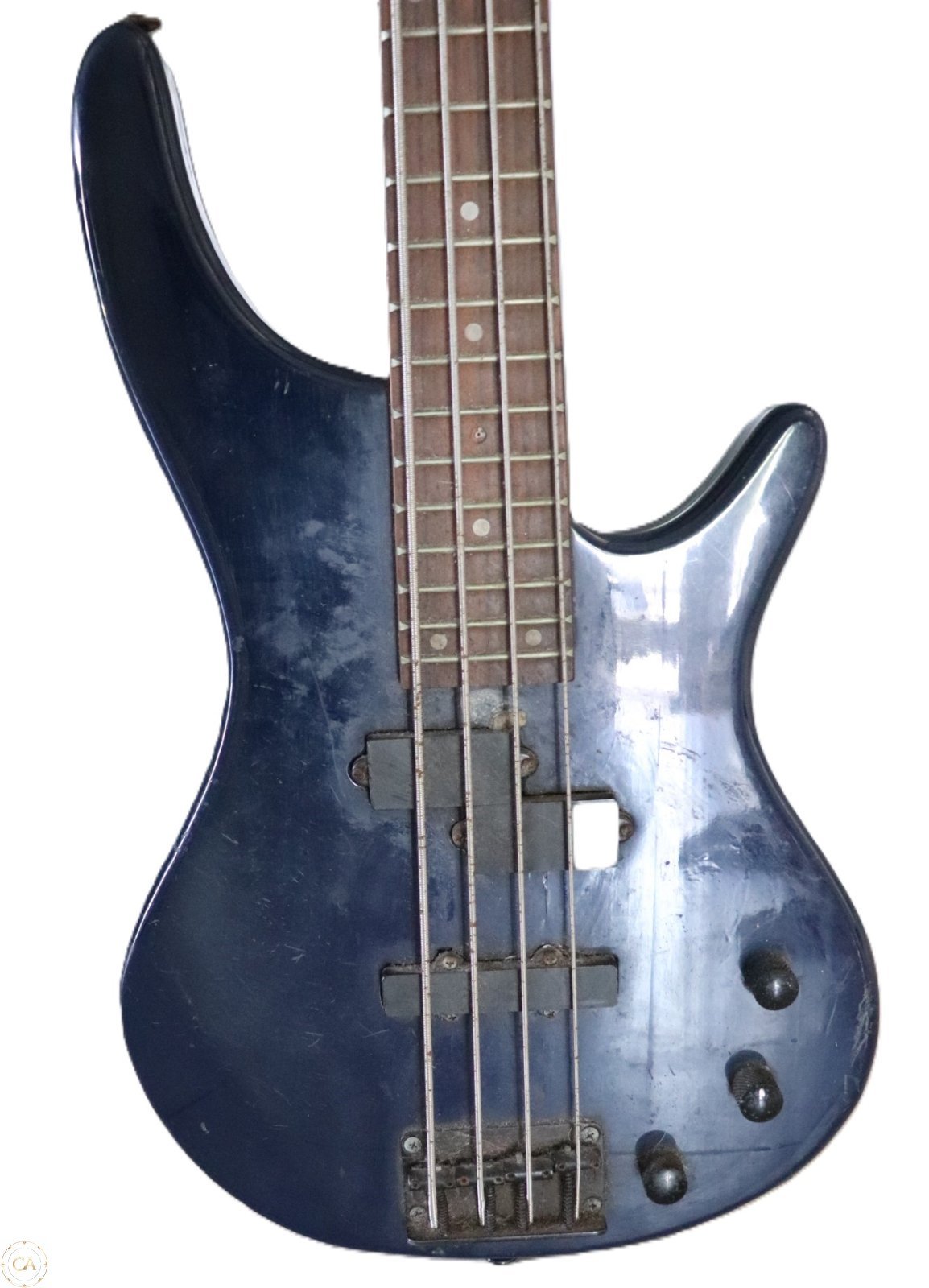 close-up Peavey bass guitar body and pickups