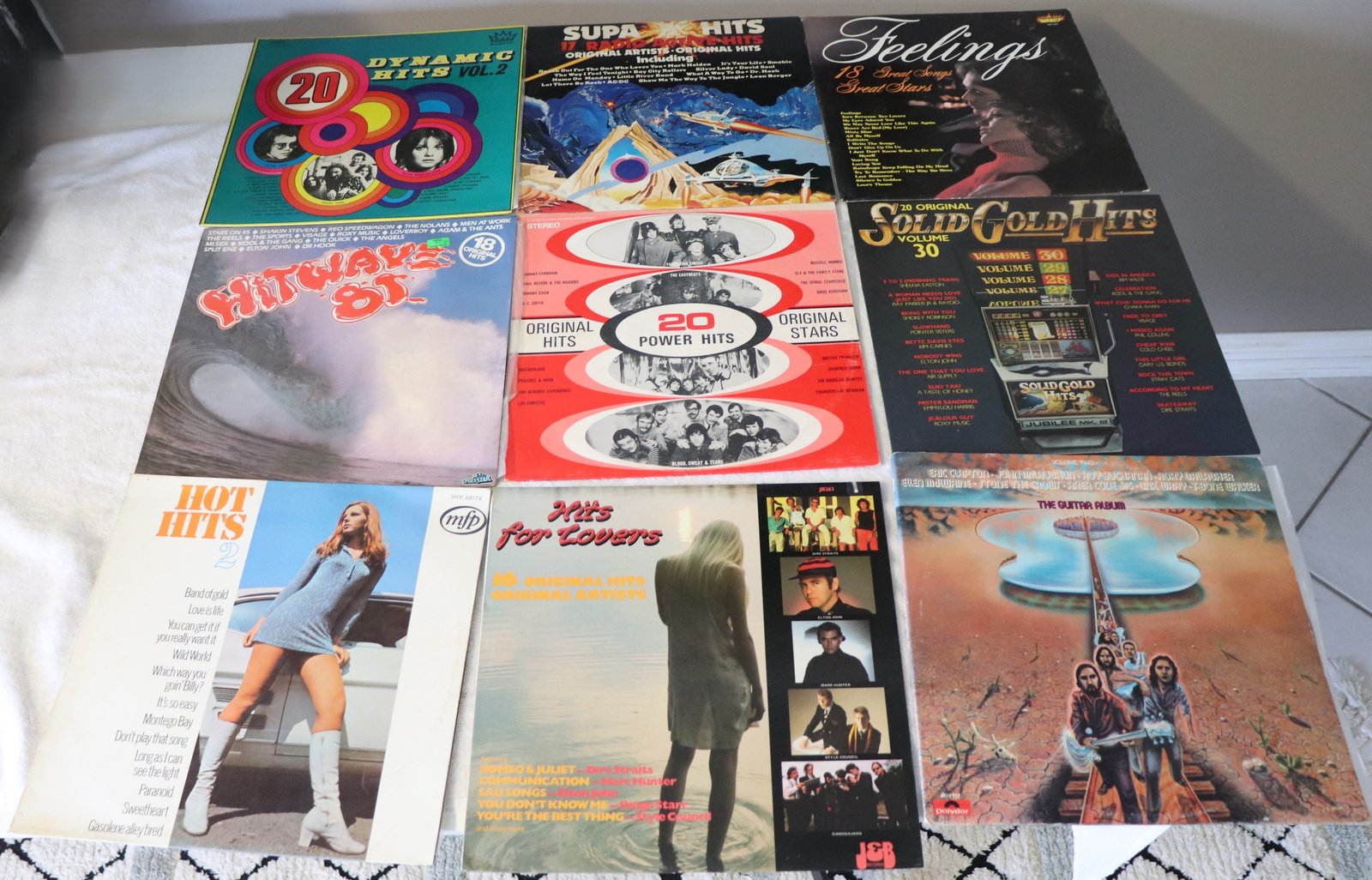 Front covers of 9 vintage compilation vinyl albums from the 60s to 80s