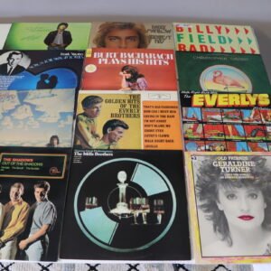 Front covers of twelve easy listening and vocal vinyl albums including Sinatra, Bacharach, and Manilow