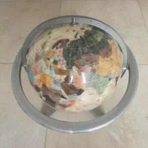 Vintage raised-relief world globe on metal stand