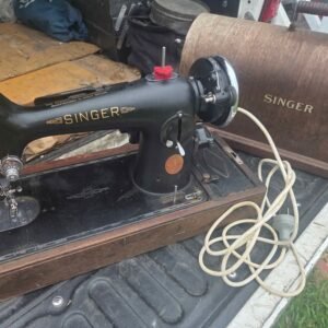 Vintage Singer sewing machine with wooden case