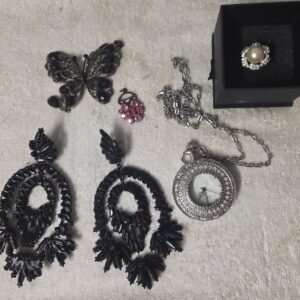 Butterfly brooch with dark stones