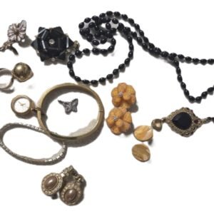 Vintage jewellery assortment including bangles and brooches