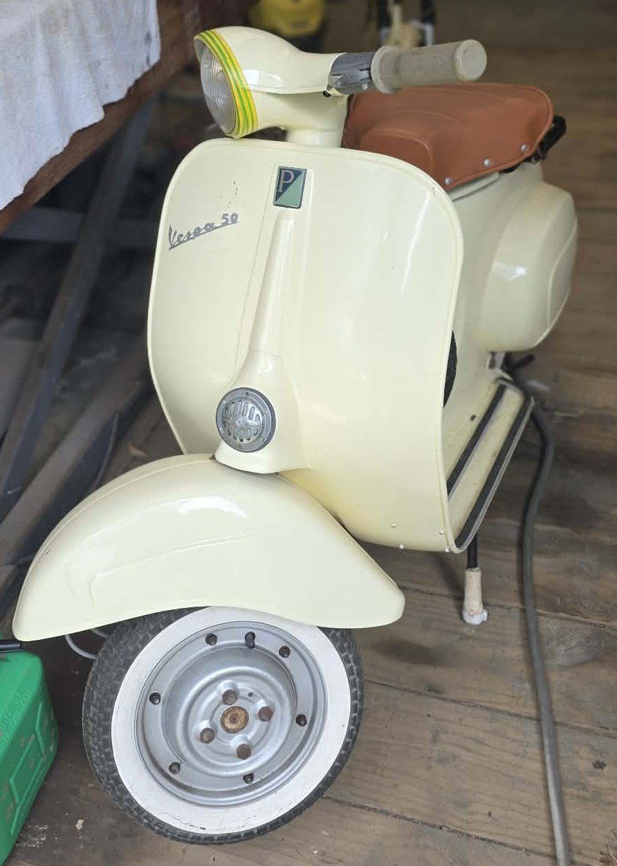 Vespa 50 side profile classic scooter