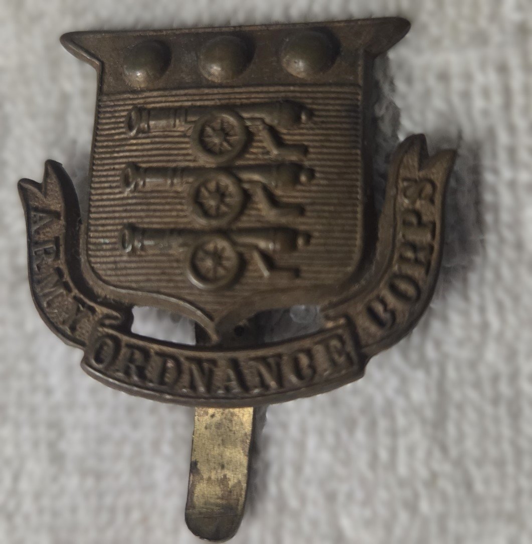 Army Ordnance Corps brass cap badge reverse with long tang fitting