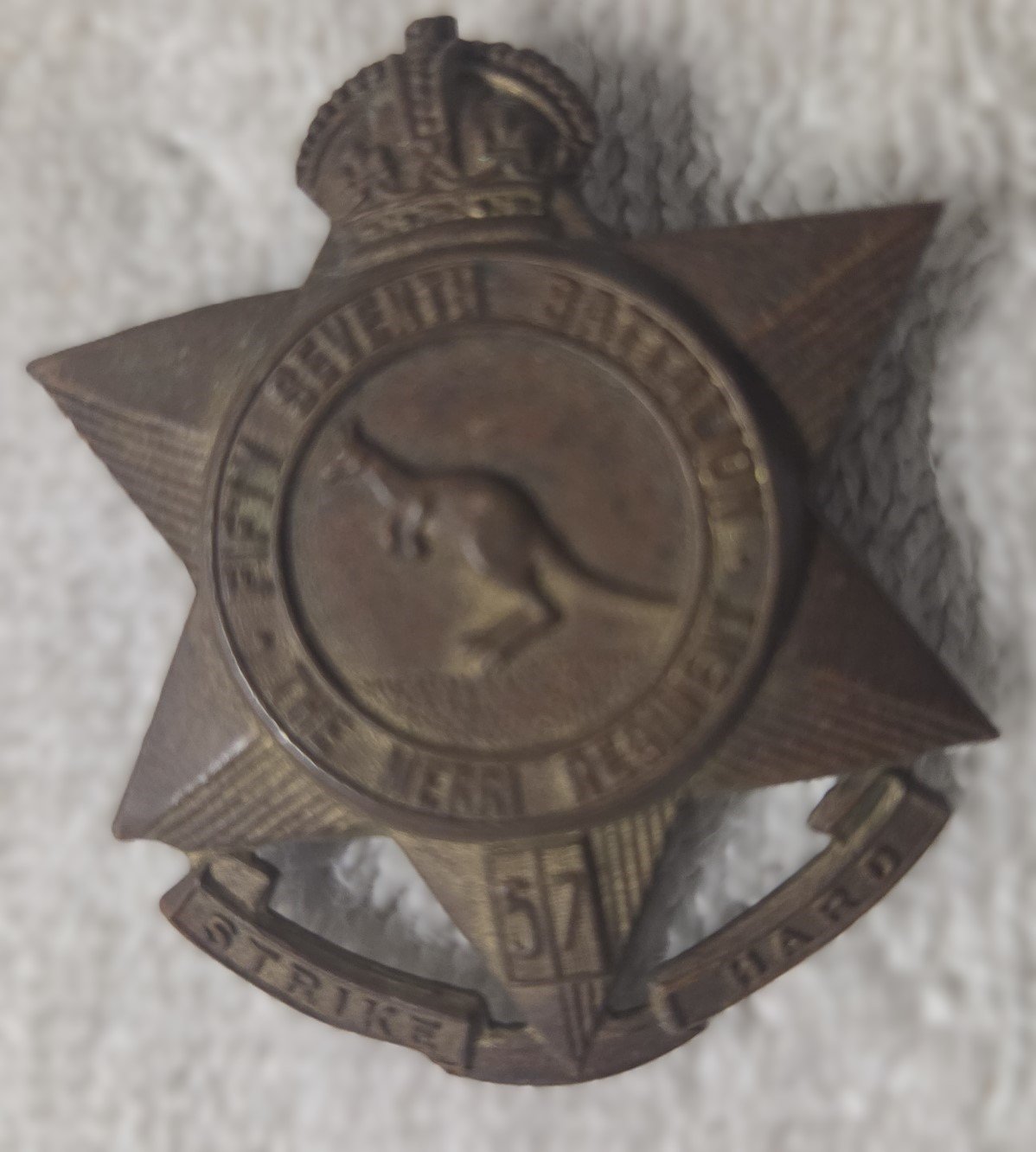 57th Battalion AIF cap badge reverse with pin fitting