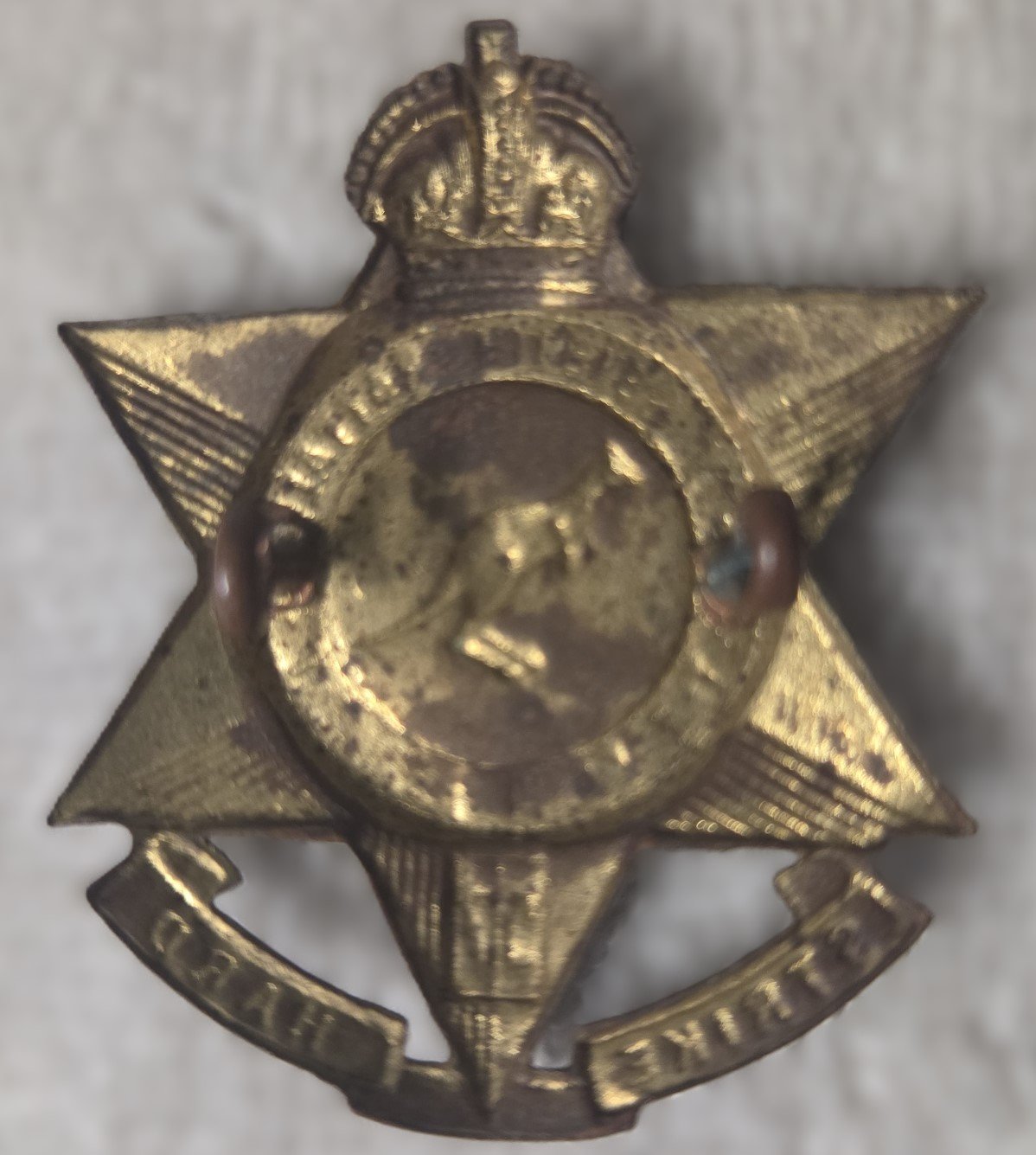 57th Battalion AIF Strike Hard cap badge front