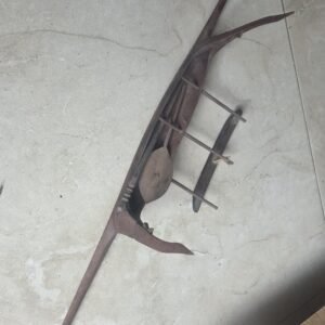 hand carved timber canoe with paddles