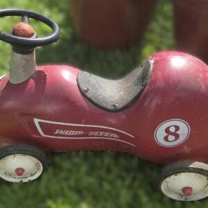 red metal ride on car radio flyer style side view