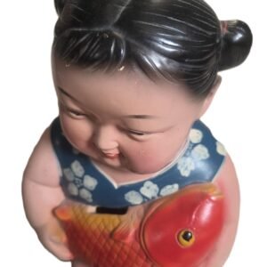 ceramic money box child holding fish