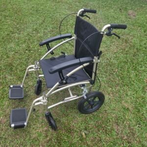 Lot 21 - Aspire Lightweight Transit Wheelchair with Attendant Brakes