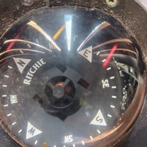 Close-up of compass face and directional markings