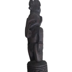 Hand carved tribal figure with hook nose