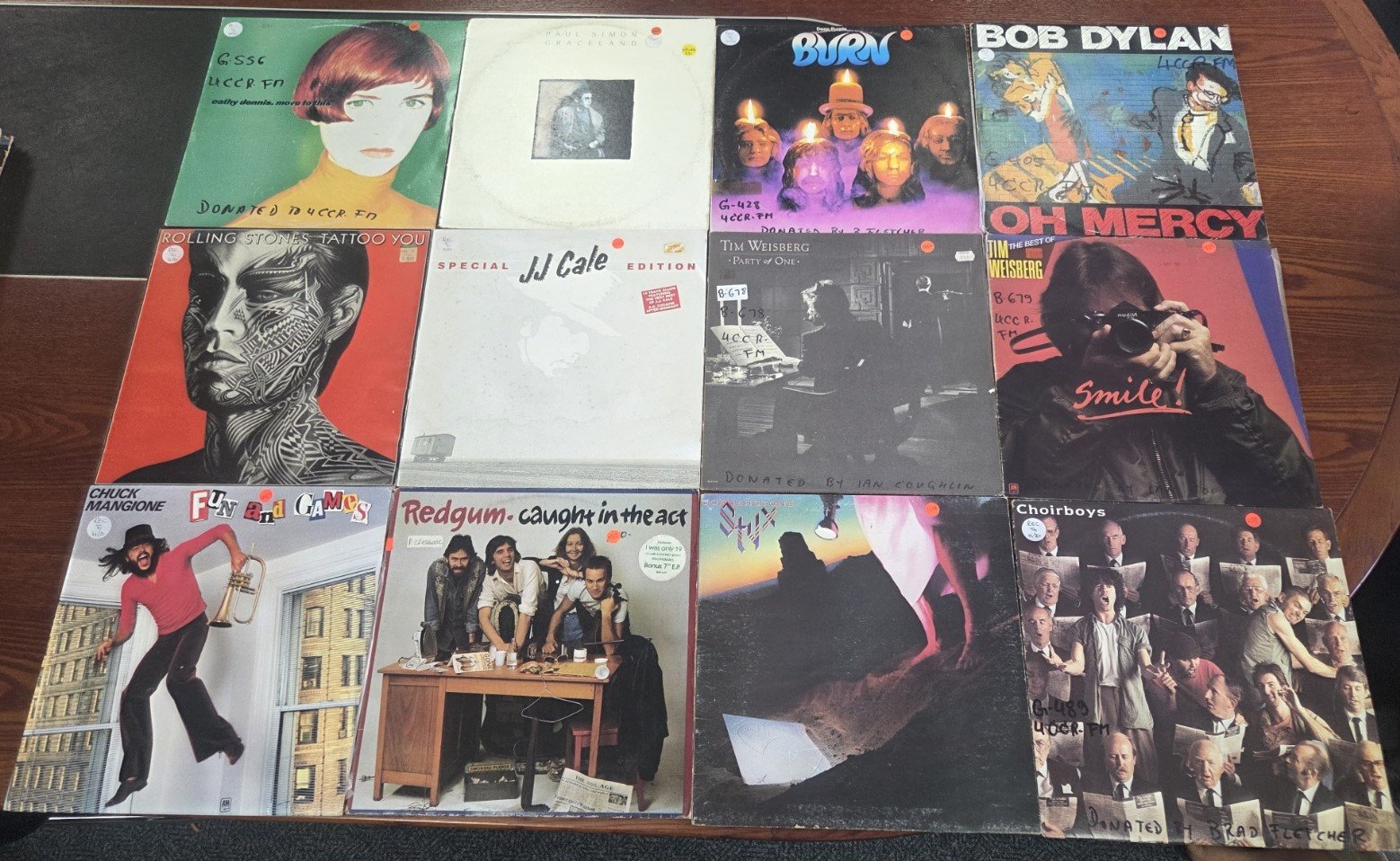 Bulk vinyl LP collection featuring Rolling Stones Tattoo You and Paul Simon Graceland