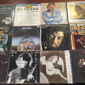 Mixed genre vinyl records including Queen and Elvis