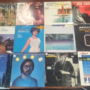 Bulk vinyl lot featuring country and rock artists