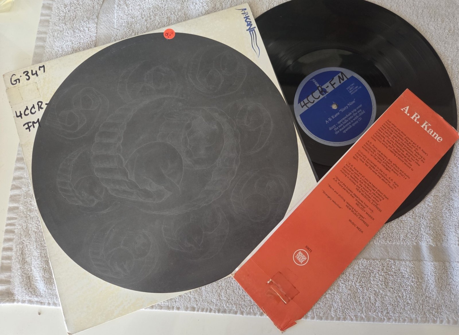 A.R. Kane 69 vinyl LP front cover with promotional wraparound strip