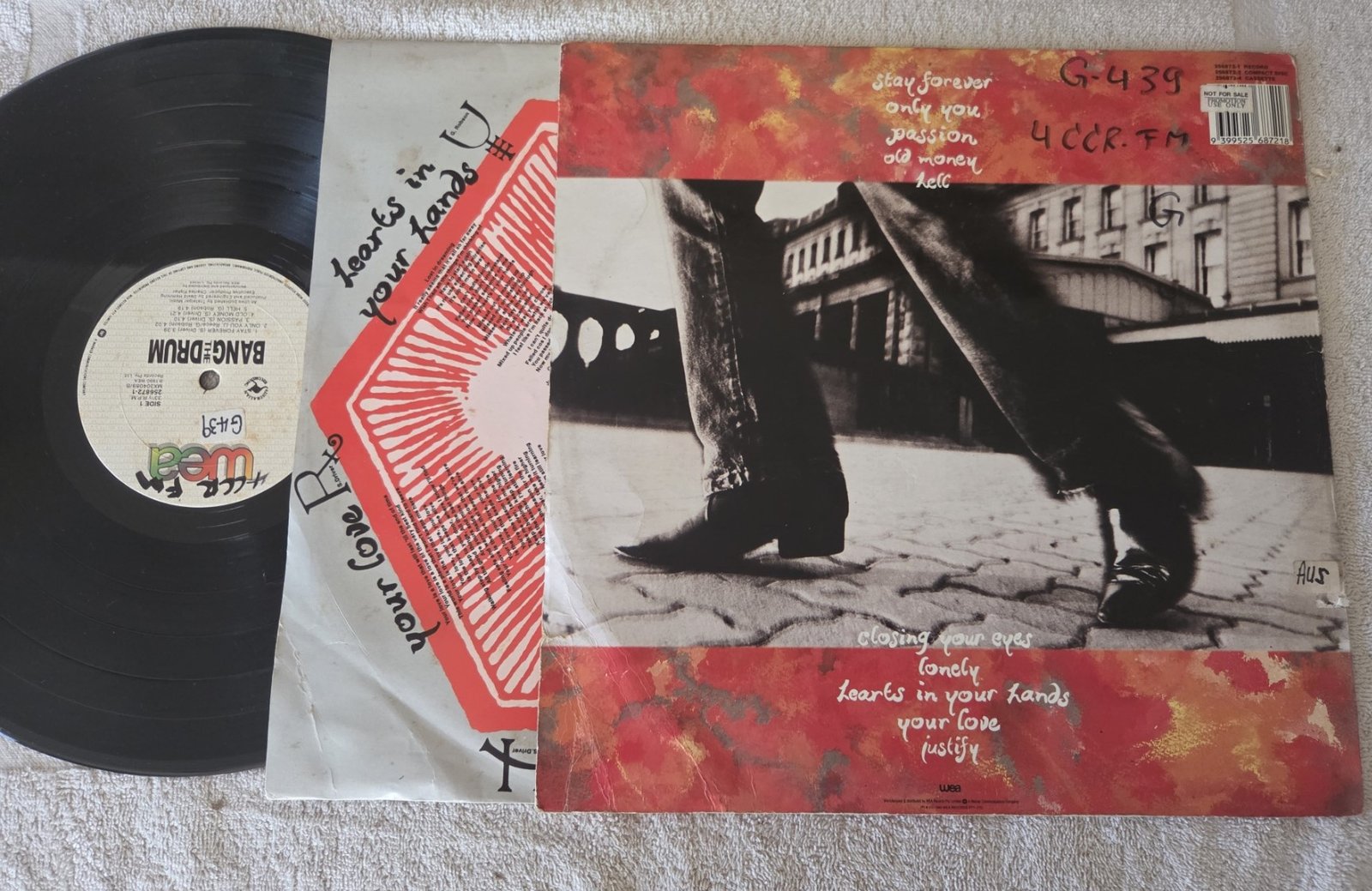 Bang the Drum LP rear cover with track listing and vinyl record