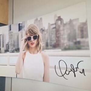 Sheppard promotional display board with Taylor Swift reverse