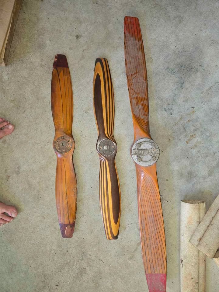 Collection of three laminated wooden aircraft propellers
