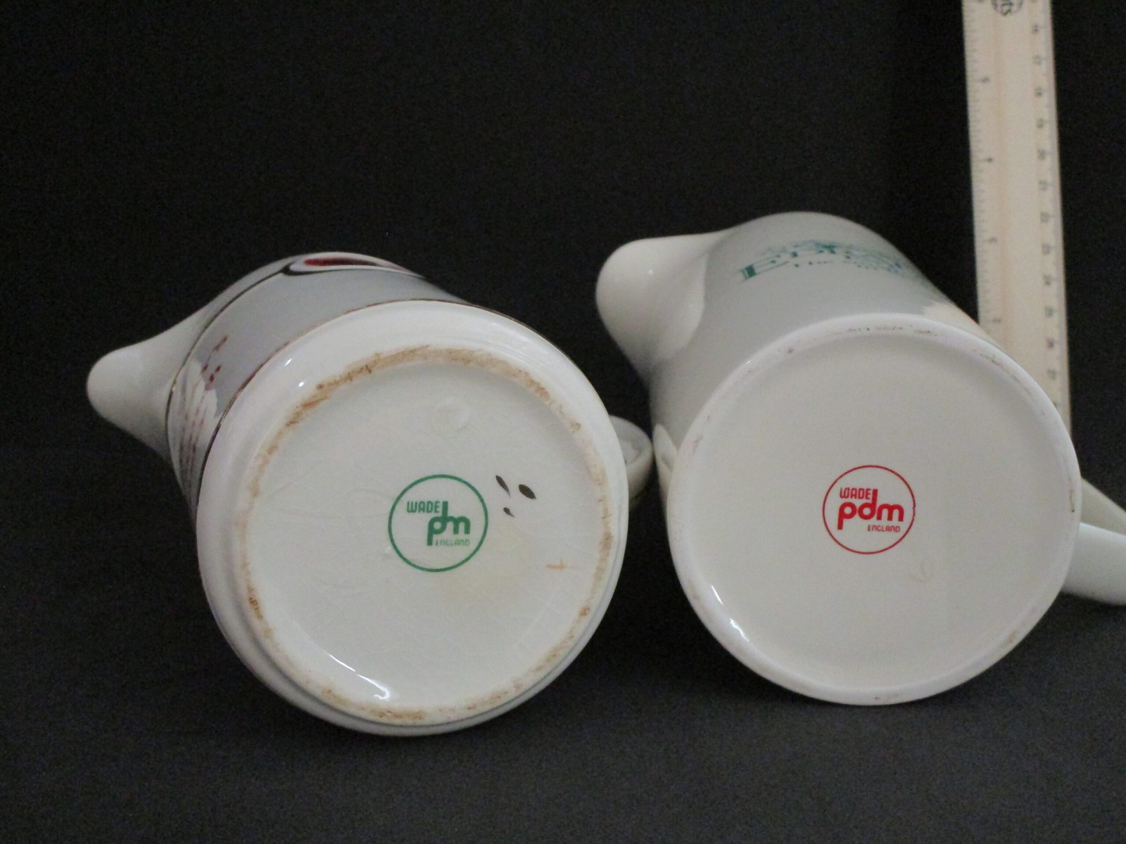 Pair of vintage whisky advertising jugs