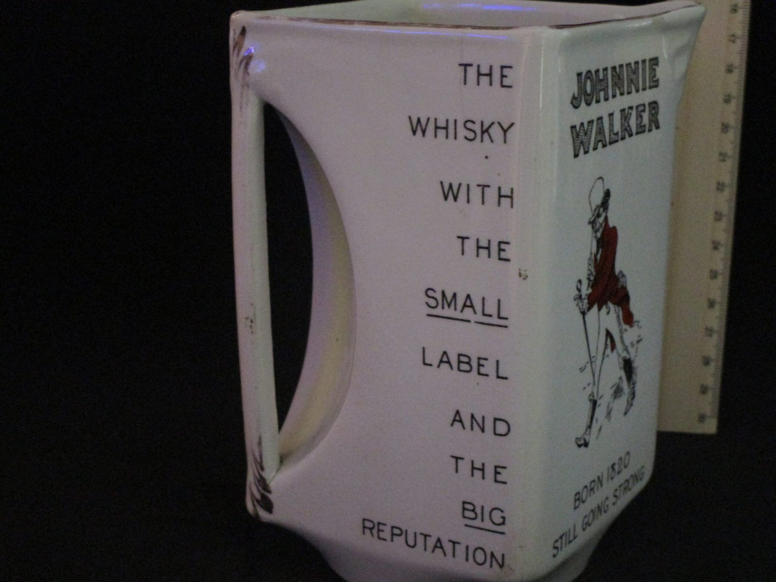Vintage whisky advertising ceramic jug