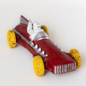 LOT016 Michelin Bibendum cast iron racing car front angle view