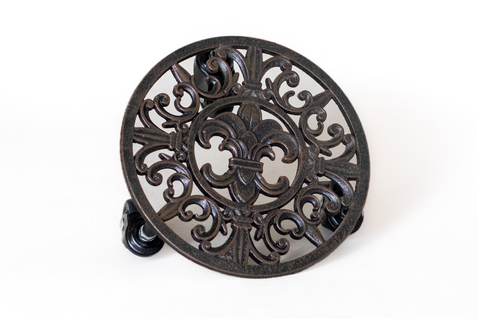 LOT022 cast iron fleur de lis plant caddy