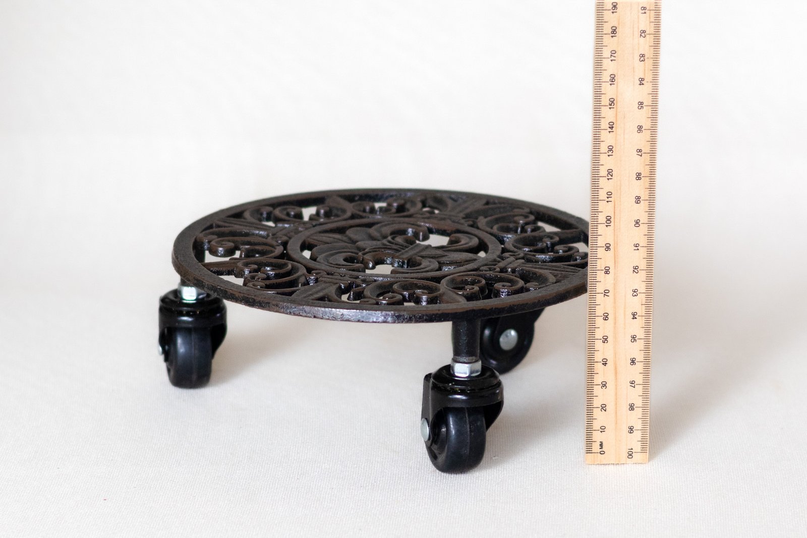 LOT022 side view cast iron plant caddy with castors