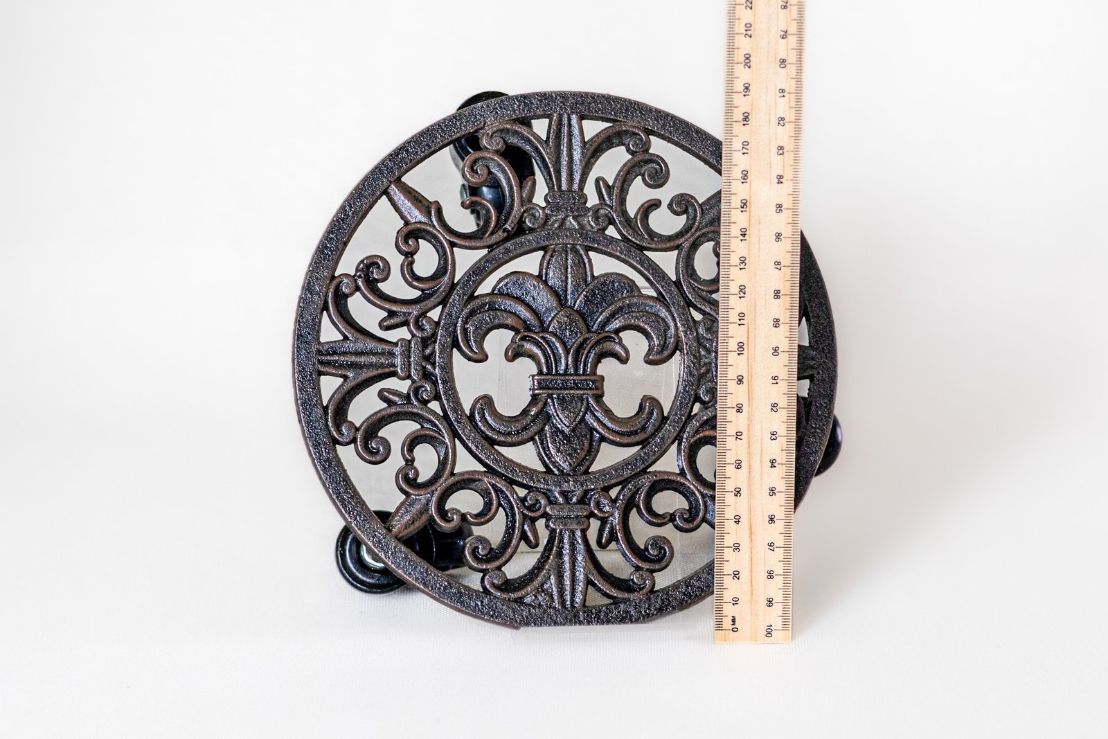 LOT022 decorative cast iron plant caddy with ruler