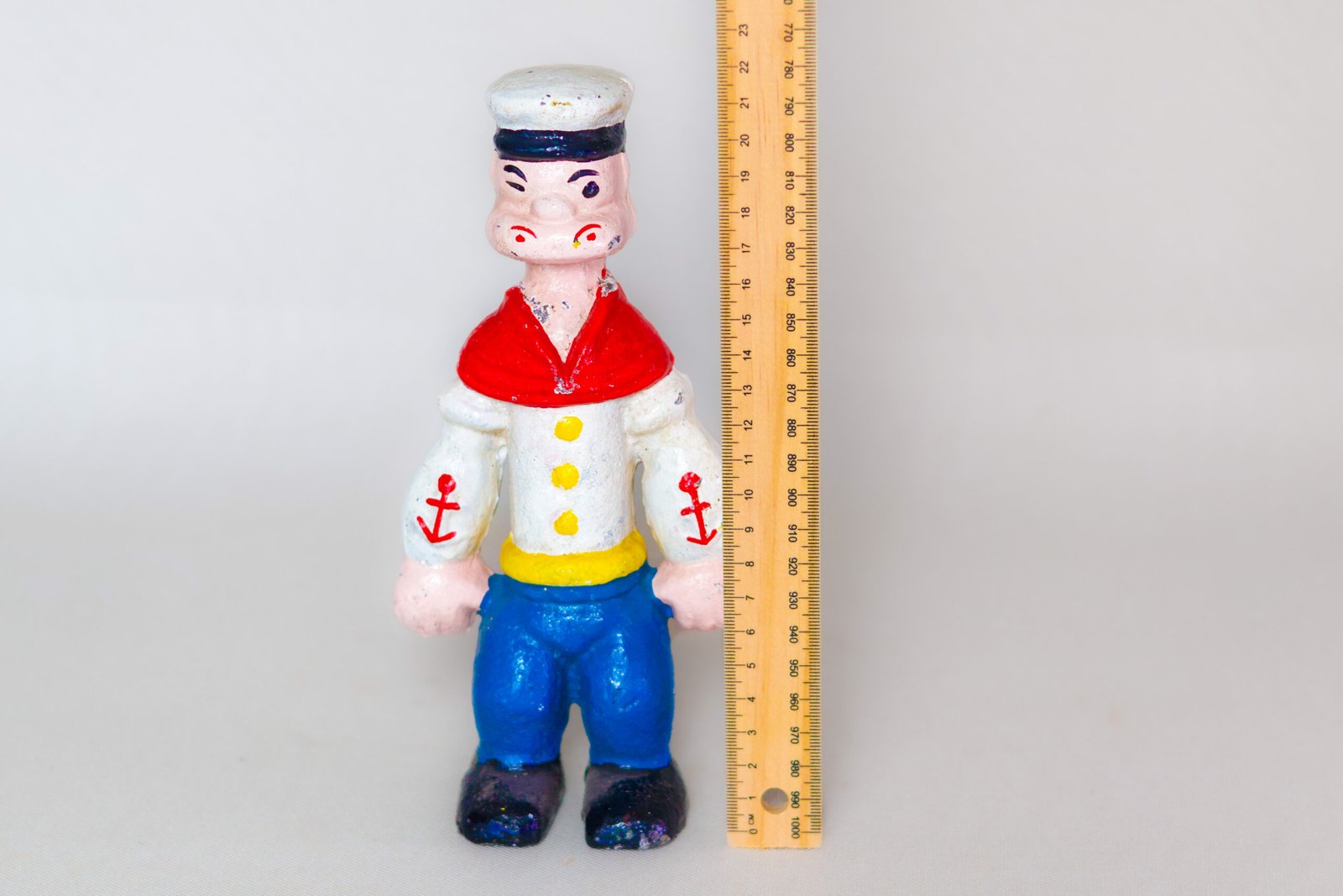 LOT023 vintage Popeye cast iron doorstop figure