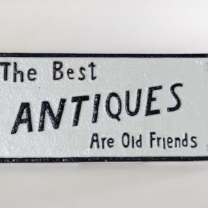 LOT002 - Cast Iron Wall Plaque 'The Best Antiques Are Old Friends'